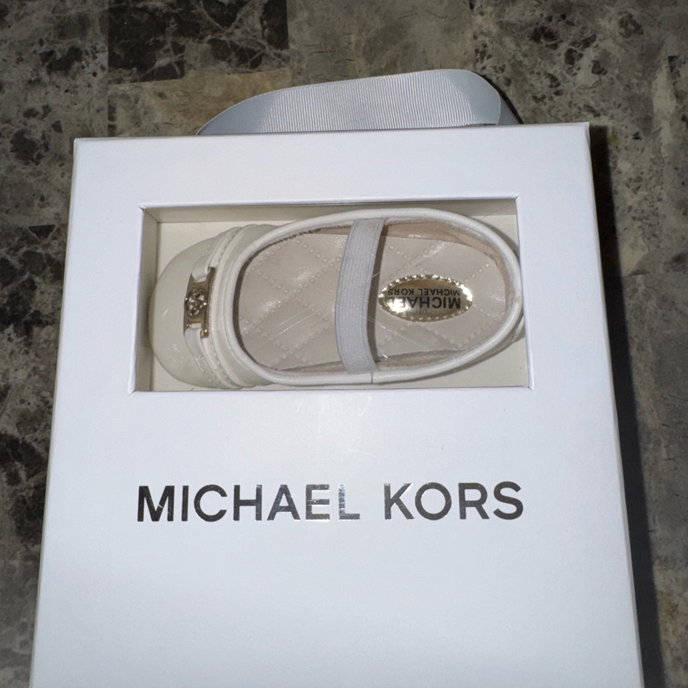 White & gold Michael Kors size 4 toddler shoe for little girls